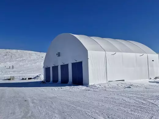 Каркасно-тентовый ангар с модульным помещением внутри