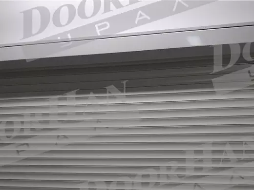 Рольставни DoorHan белого цвета с ручной механической системой открывания